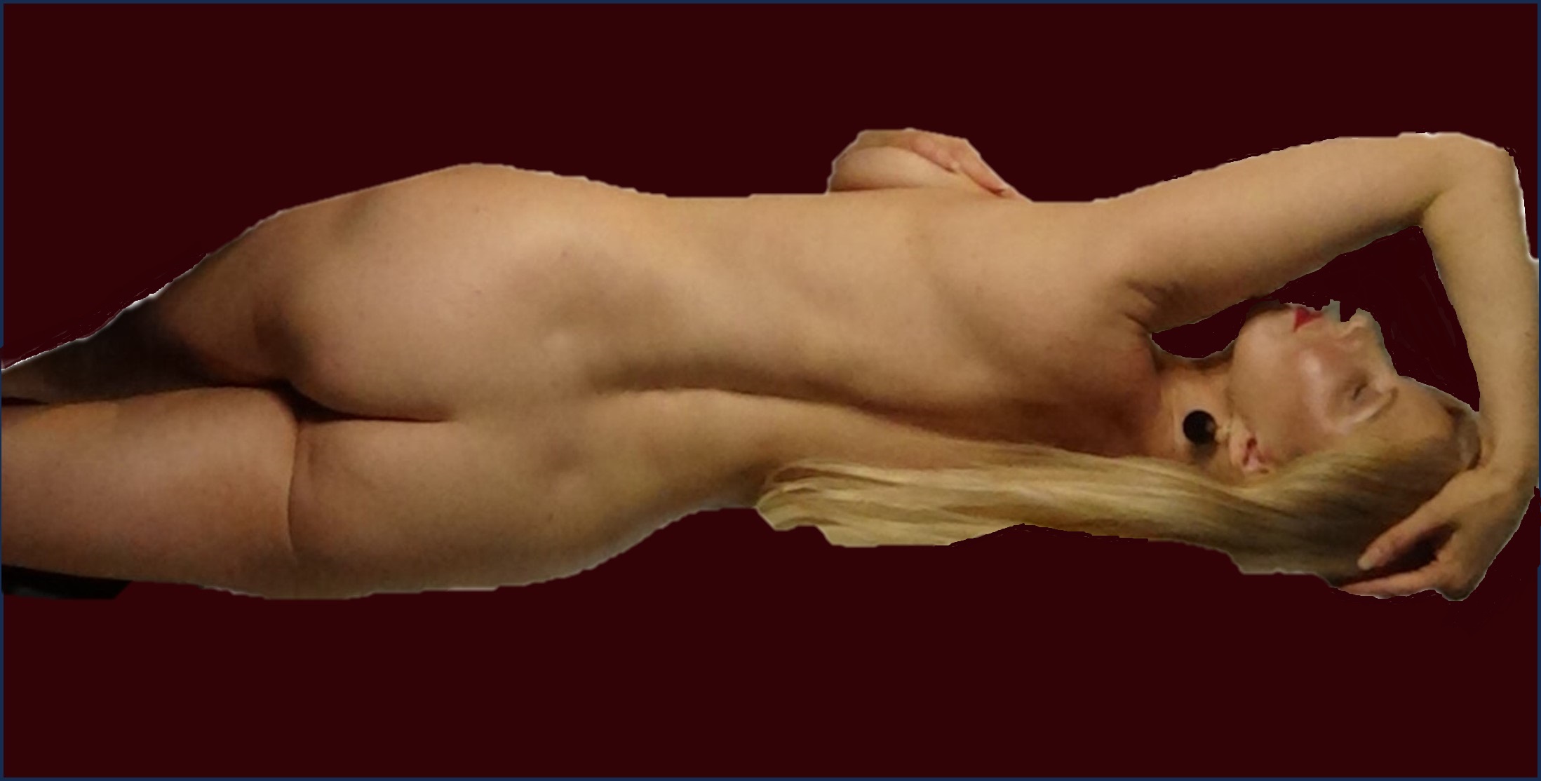 Francesca is a Naturist Massage Therapist. She is pictured lying naked, her back facing the camera